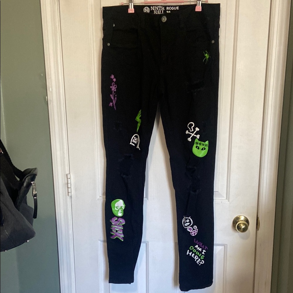 Black Skinny Jeans with Unique Graphic Designs
